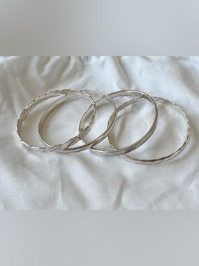 Silver bangle bracelets, set of four